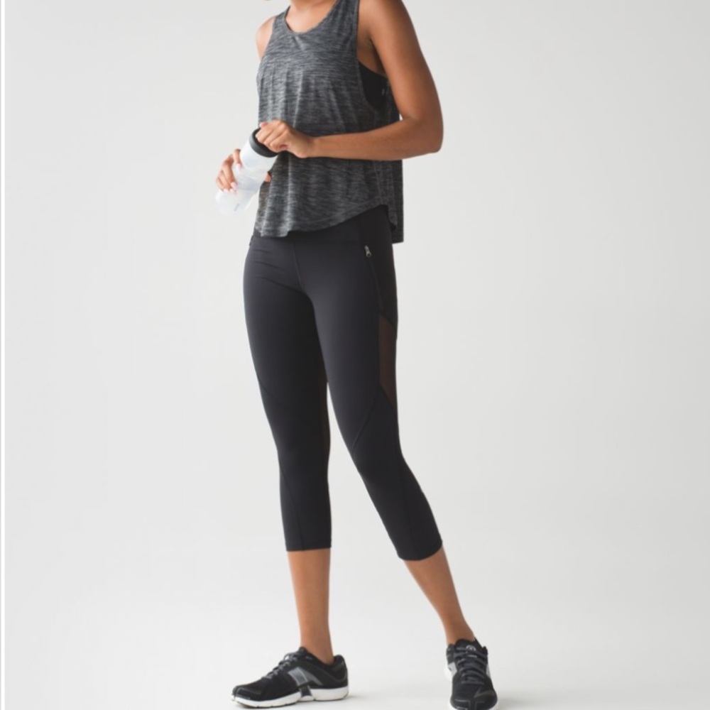 Lululemon Rush Hour 21" Crop Black zip pocket mesh tights